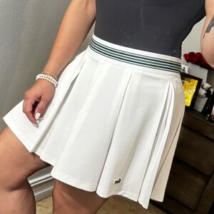 Lacoste White Pleated Tennis Skirt with Green-Striped Waistband